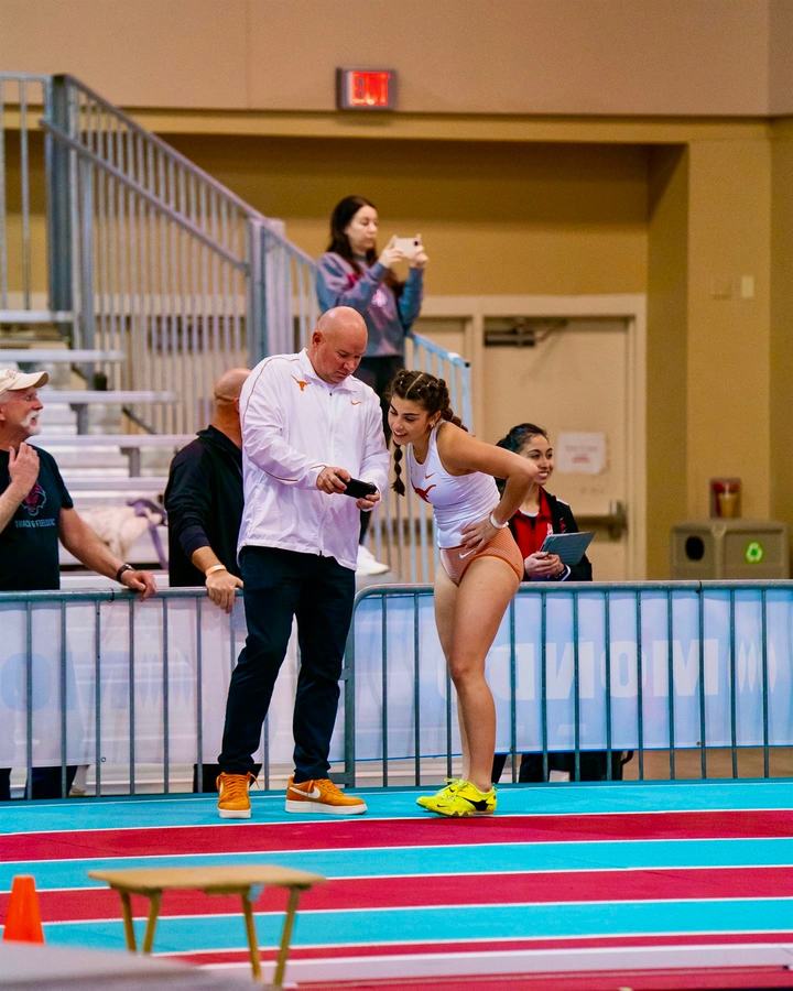 Sophia Kowalski on the runway at an indoor meet for Texas